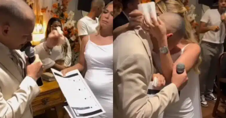 Foto de boda. Pareja abrazada sosteniendo papel con resultados médicos